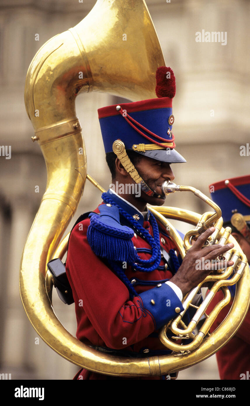 Lima, Peru. Guardsman playing the sousaphone at the gates of the Presidential Palace. Stock Photo