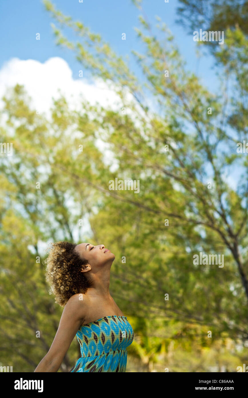 Woman enjoying fresh air outdoors Stock Photo