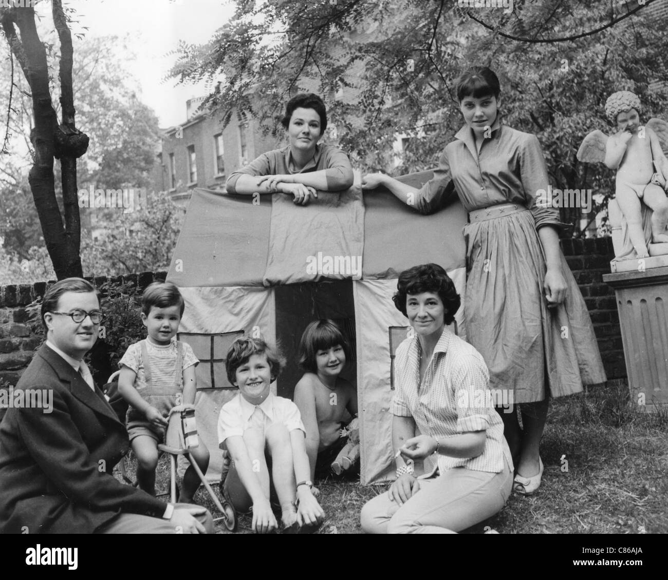 JOHN MORTIMER  English writer with wife Penelope and family including step-children  at St John's Wood home in 1951 Stock Photo
