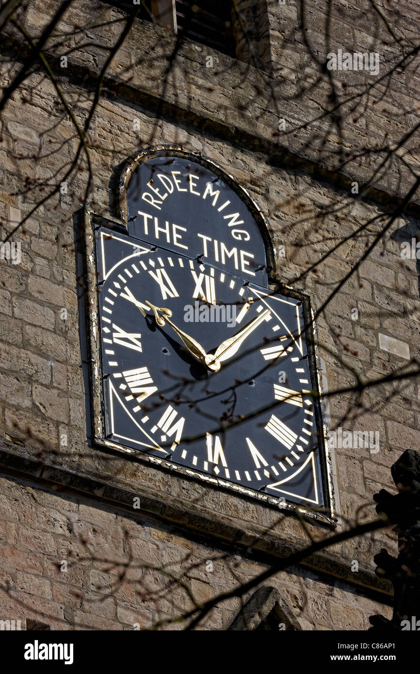 Redeeming The Time clock face on the Parish Church of St John the Baptist, Knaresborough