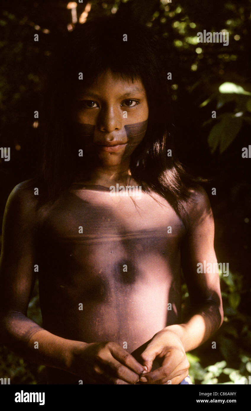 Catete Village, Para State, Brazil; young Xicrin Kayapo boy with black genipapo body and face paint. Stock Photo
