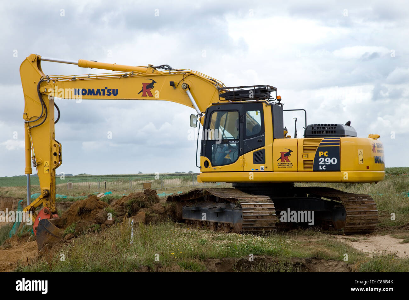 Komatsu PC 290 LC tracked 360 excavator at work on a coastal erosion