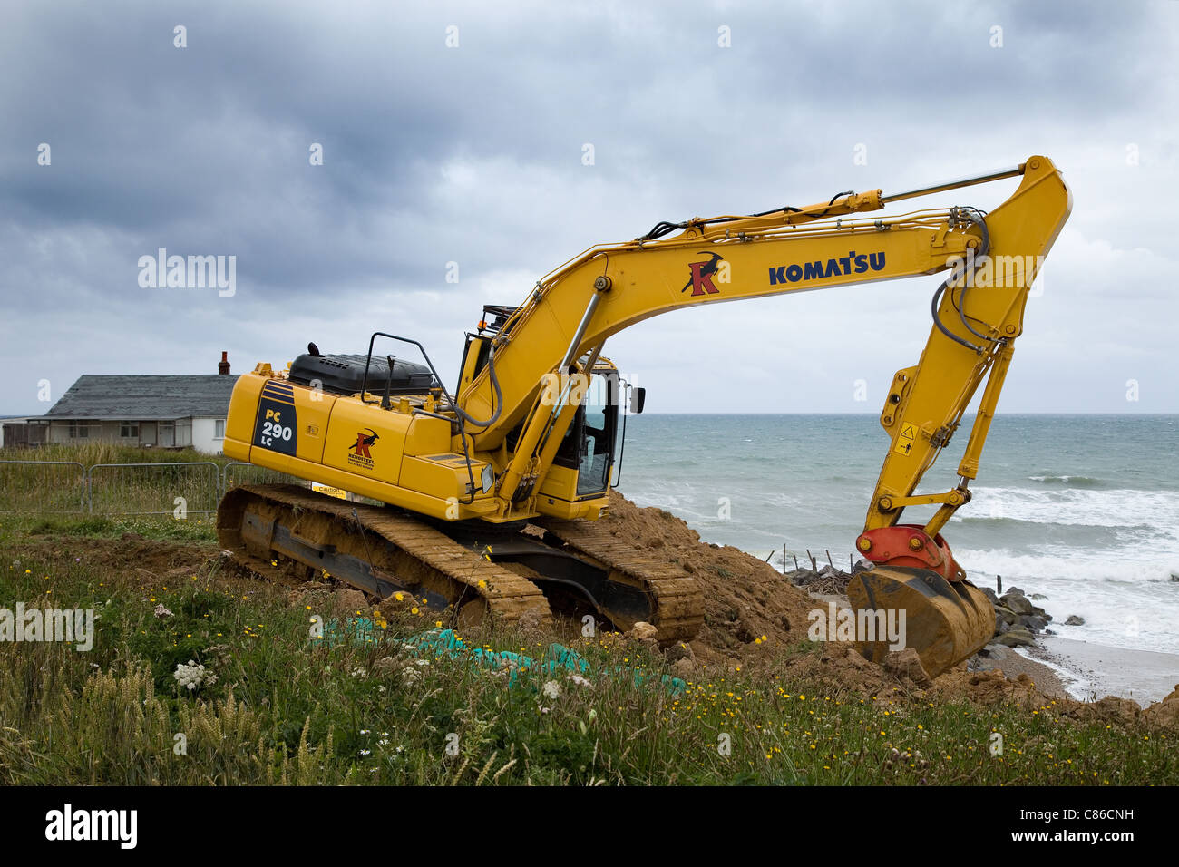 Komatsu PC 290 LC tracked 360 excavator at work on a coastal erosion