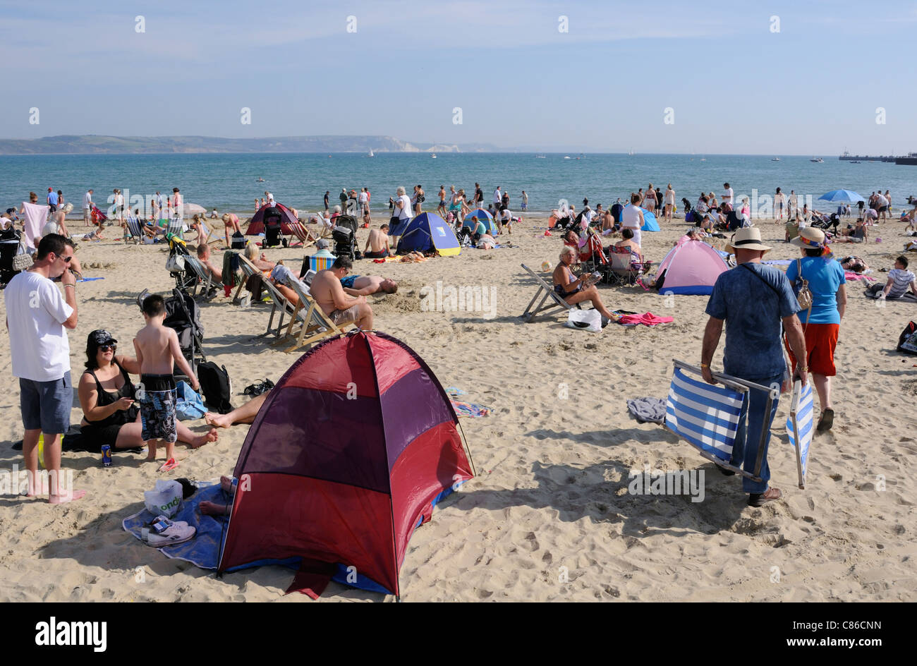 Crowded beach scene at Weymouth a Dorset England seaside resort and ...