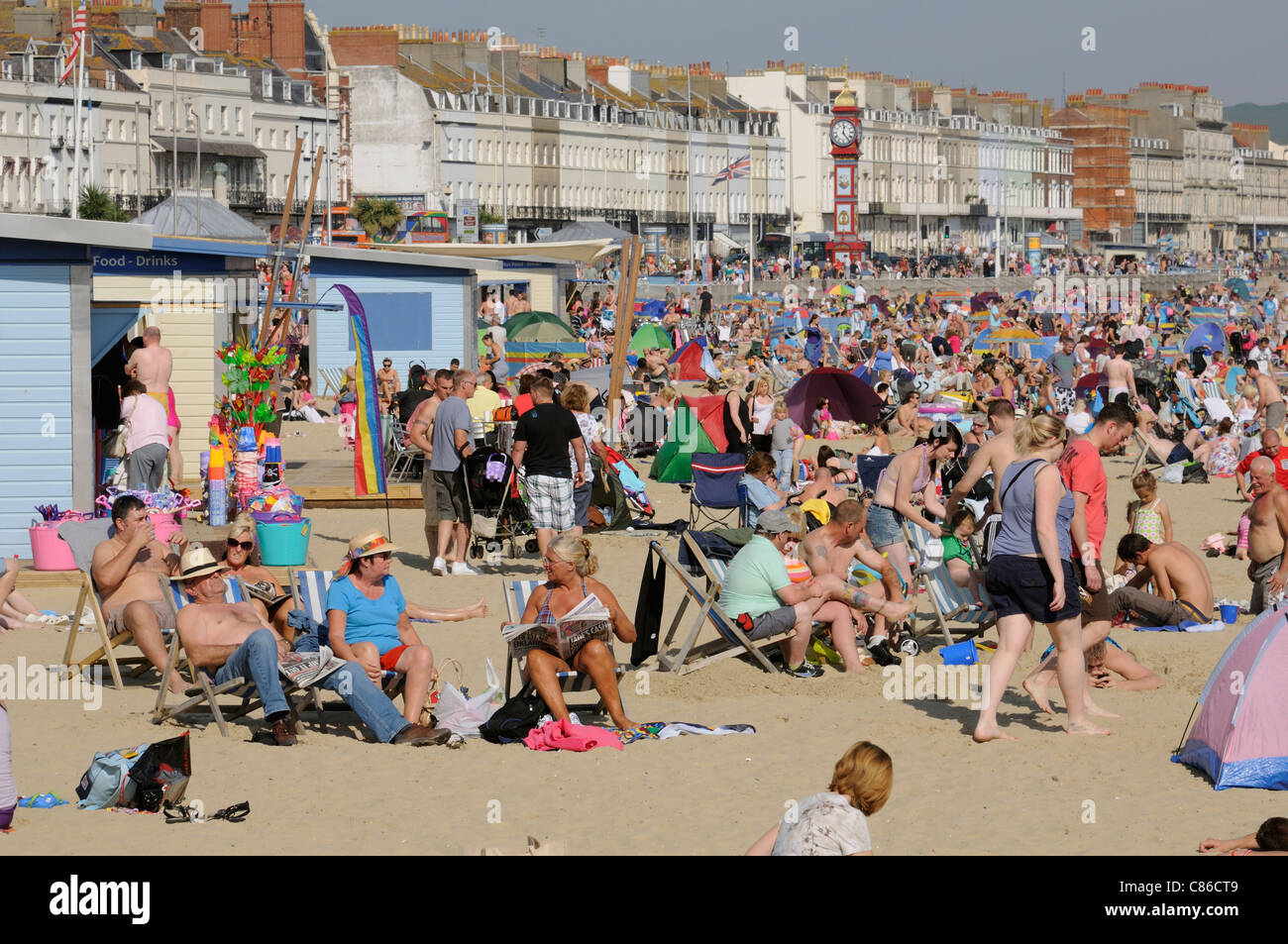 Crowded beach scene at Weymouth a Dorset England seaside resort and ...