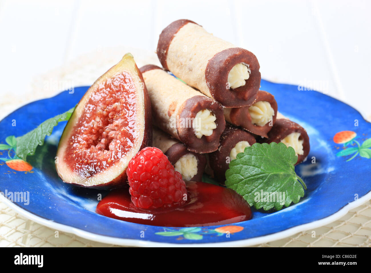 Tubeshaped pastry shells filled with sweet creamy filling Stock Photo