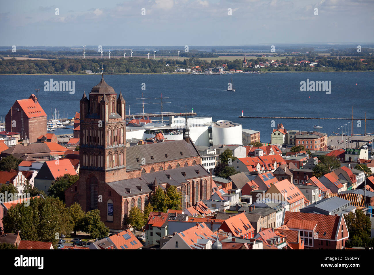 view over the historic centre of Stralsund with Saint James's Church, Ozeaneum and Ruegen island, Stralsund, Germany Stock Photo