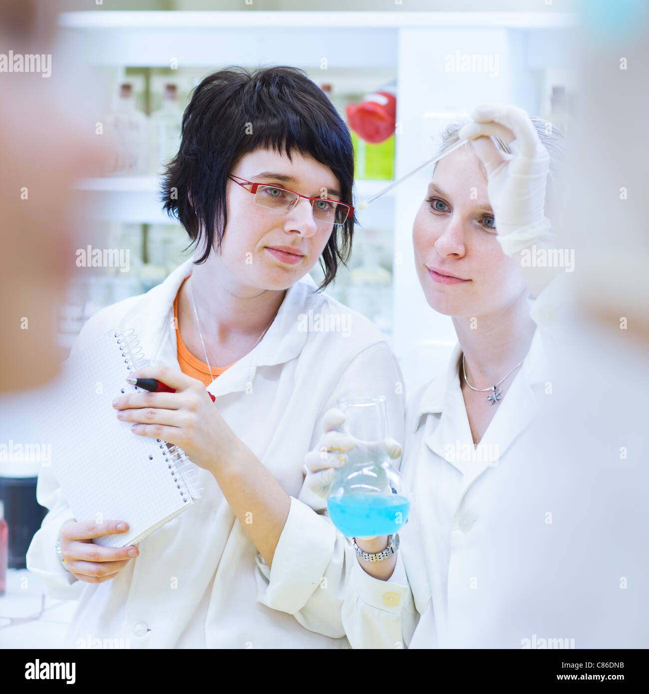 Two female researchers in a chemistry lab Stock Photo Alamy