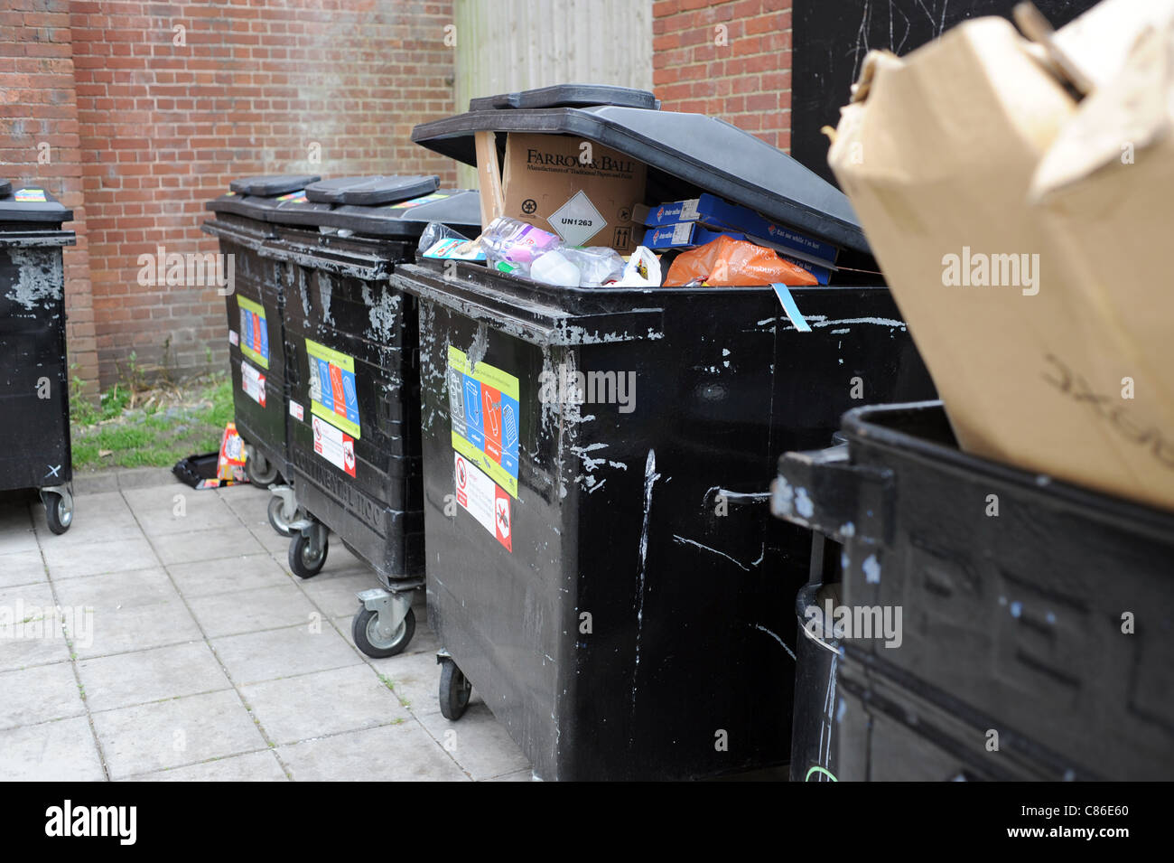 Overflowing council public recycling bins in Brighton east Sussex UK