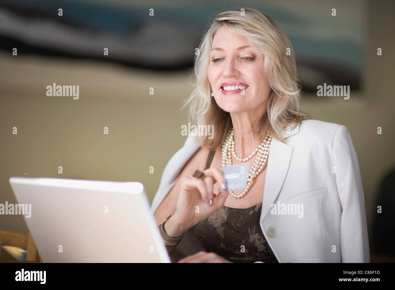 Businesswoman shopping on the internet Stock Photo