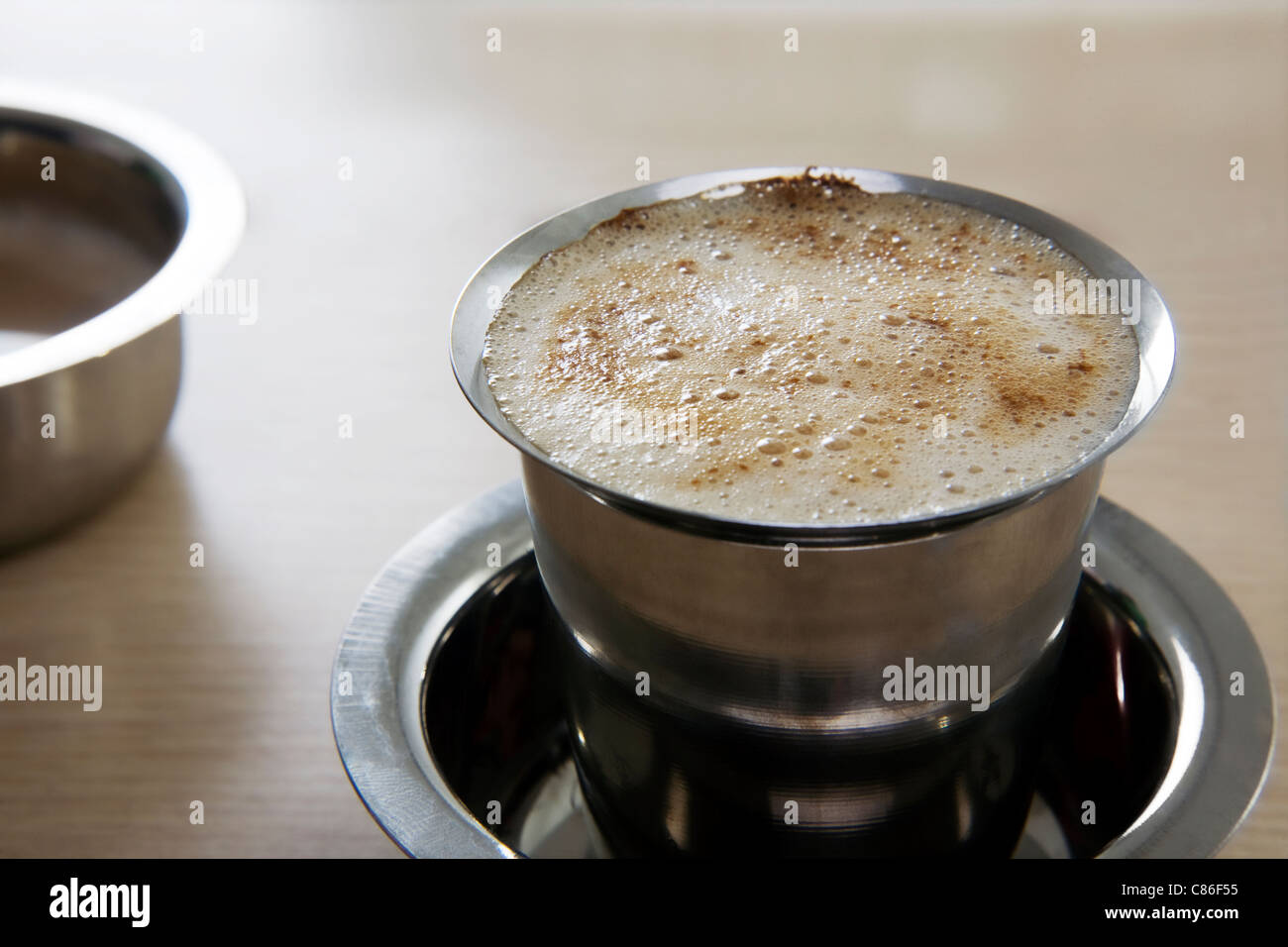 Filter coffee served in a tumbler Stock Photo