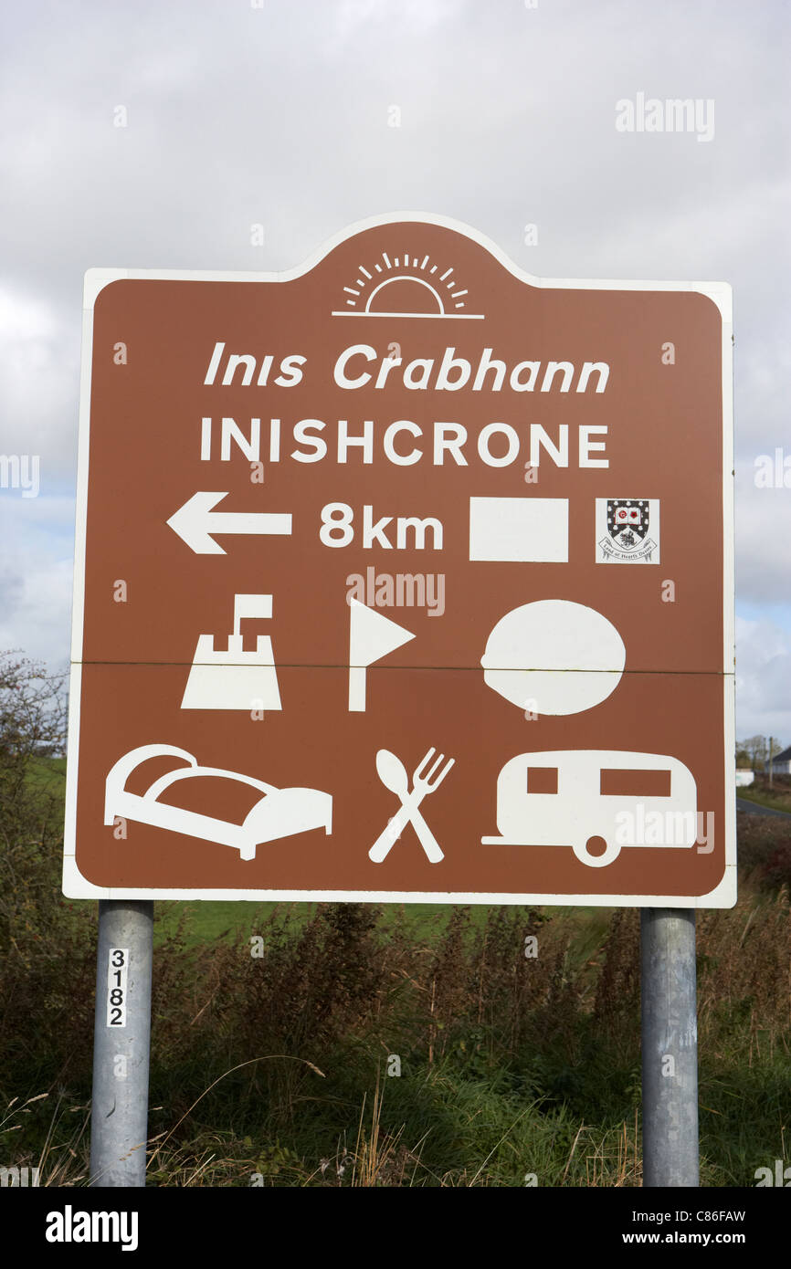 brown tourist inishcrone bilingual irish gaelic english road sign signpost republic of ireland. Stock Photo