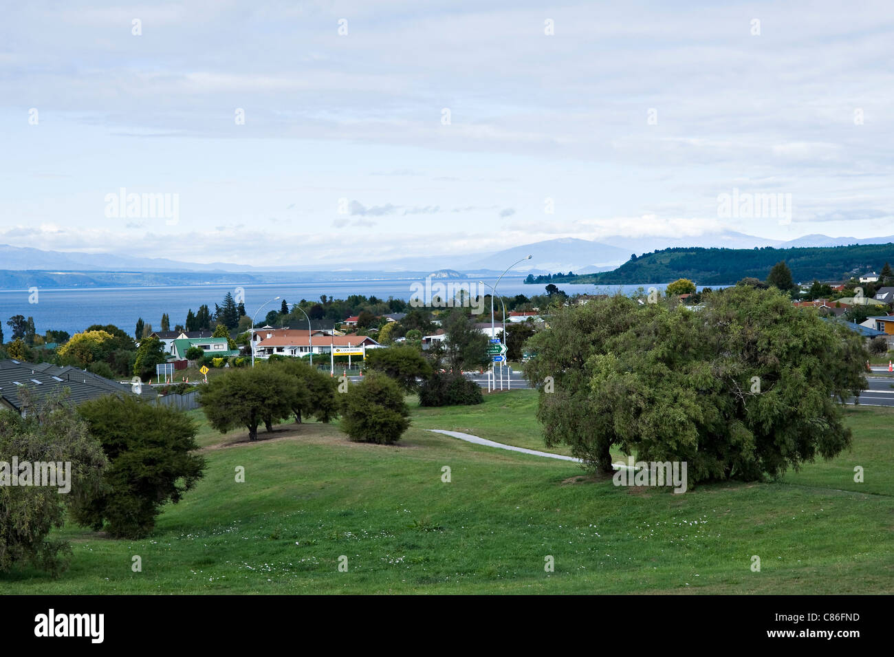 View of Taupo Town and Taupo Great Lake with Mountains Behind North Island New Zealand Stock Photo