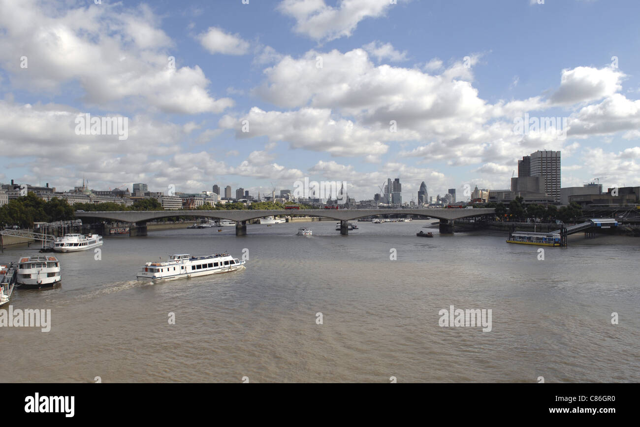 The River Thames looking East towards the City. This was taken from The Golden Jubilee Footbridge. St. Paul's is a landmark. Stock Photo