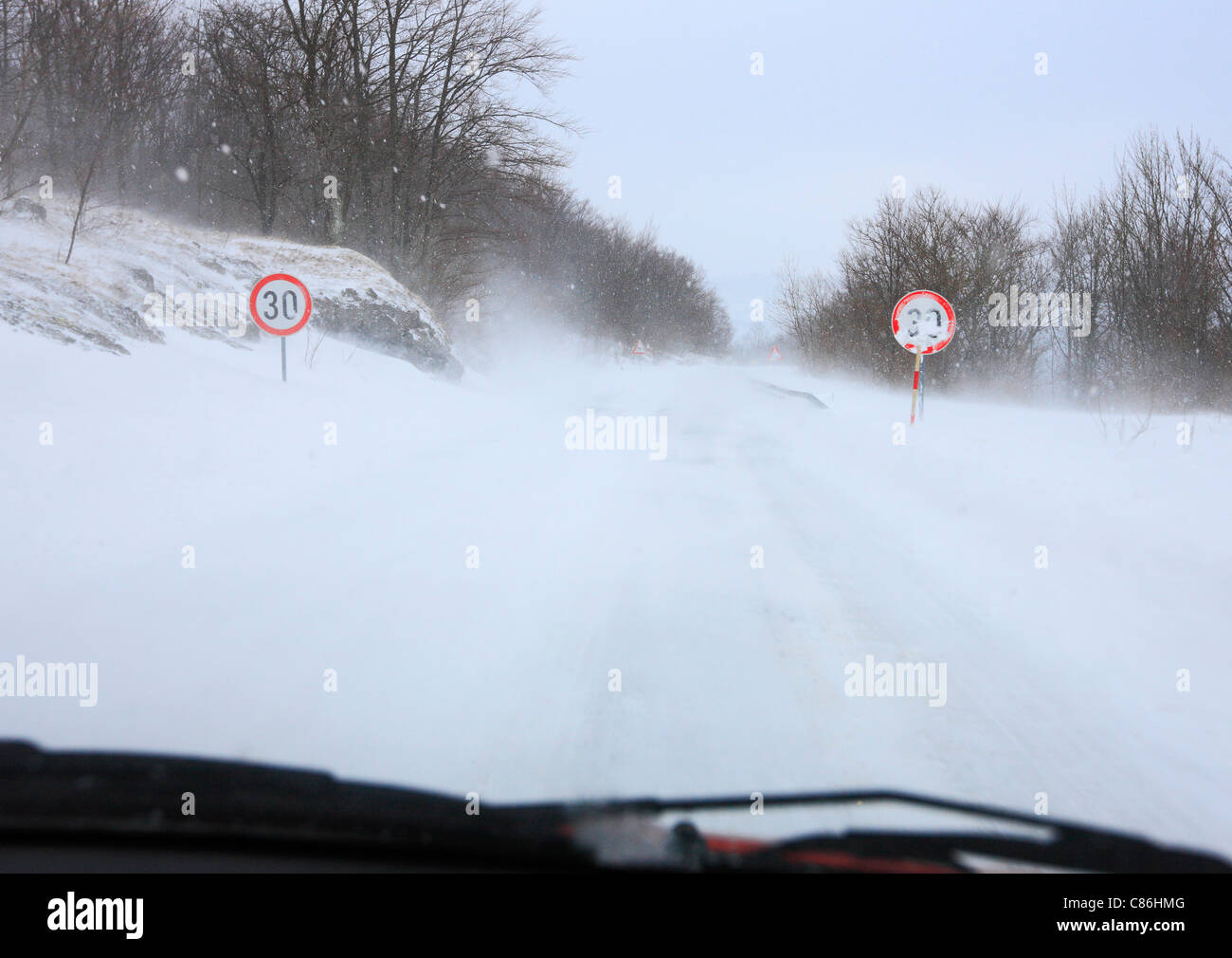 Ice and frozen road in winter snow covered. Stock Photo