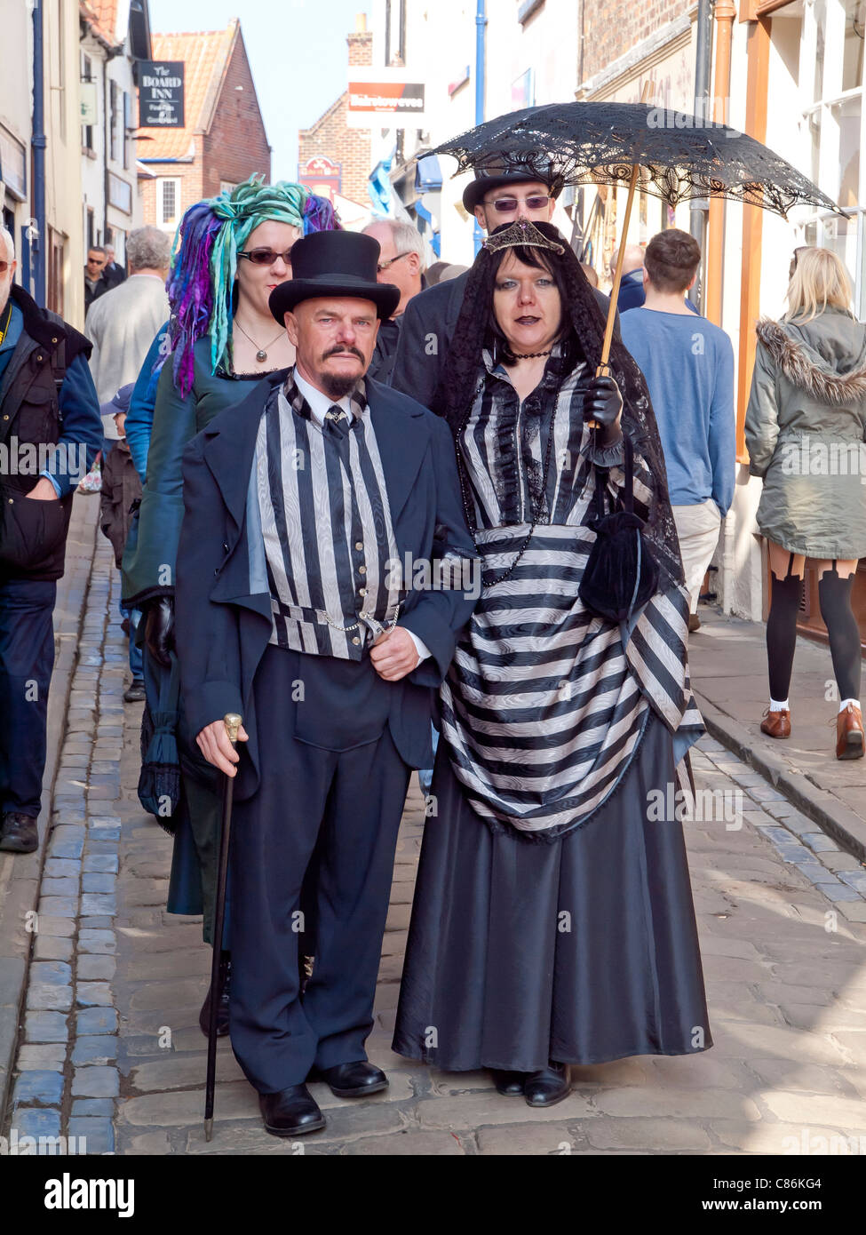 A man and his woman partner in Victorian Gothic dress at the Whitby Goth Week End spring 2011 Stock Photo