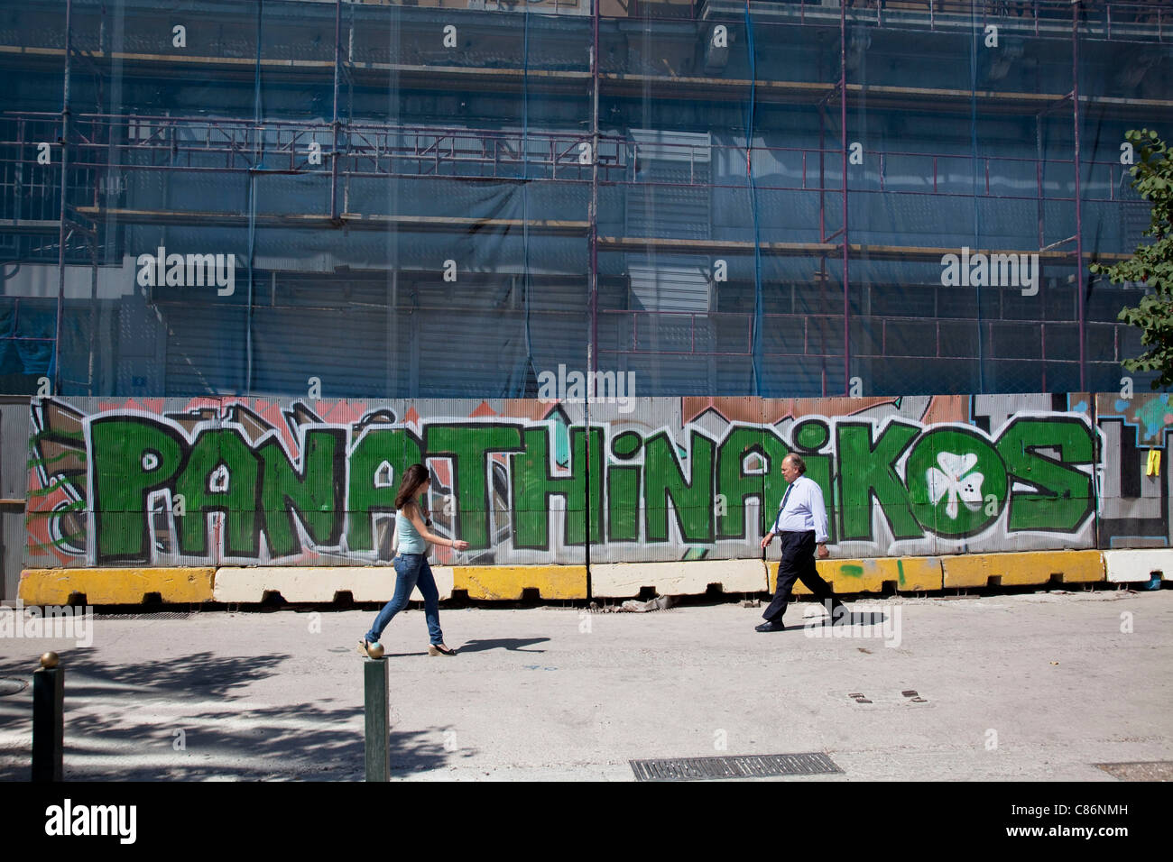 Graffiti in Omonia in support of Greek football team Panathinaikos. The name and symbol 'Triffili' is seen all over Athens. Stock Photo
