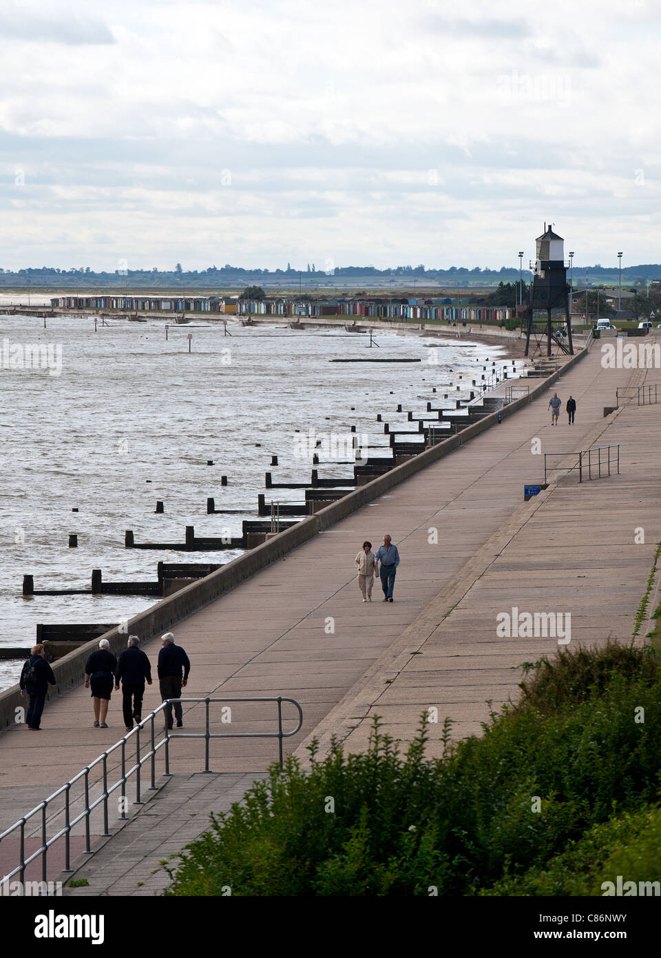 People walking along the promenade at Dovercourt in Essex Stock Photo ...