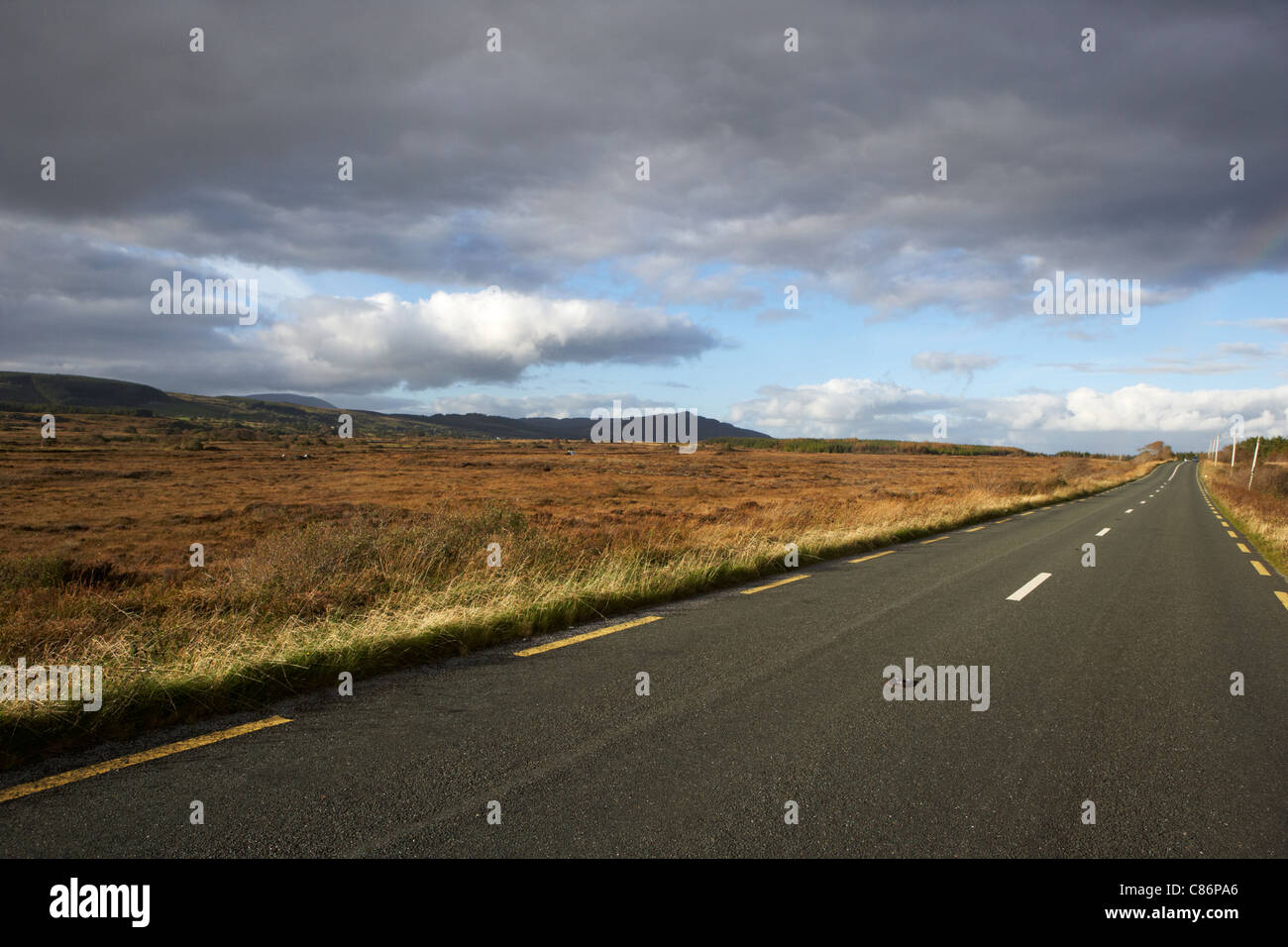 road through bogland and open rough ground in county mayo republic of ireland Stock Photo