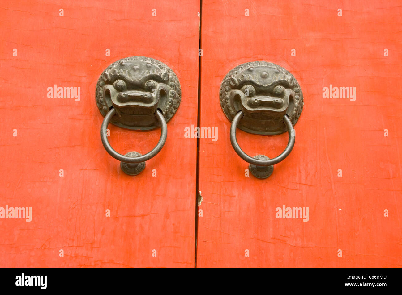 Pair of dragon head door knockers at Jade Buddha Temple Shanghai China Asia Stock Photo