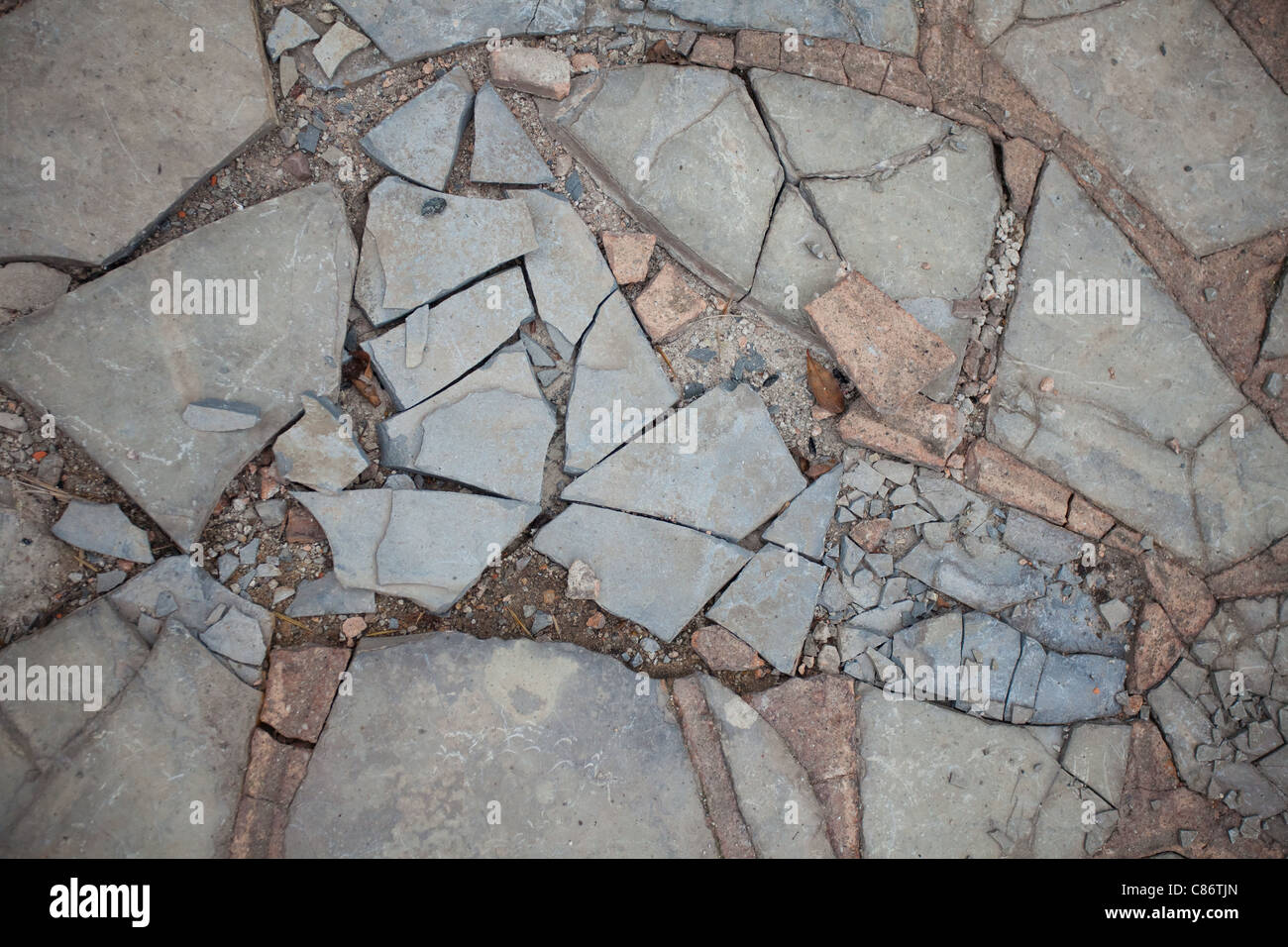 Broken crazy paving in a patio detail Stock Photo Alamy