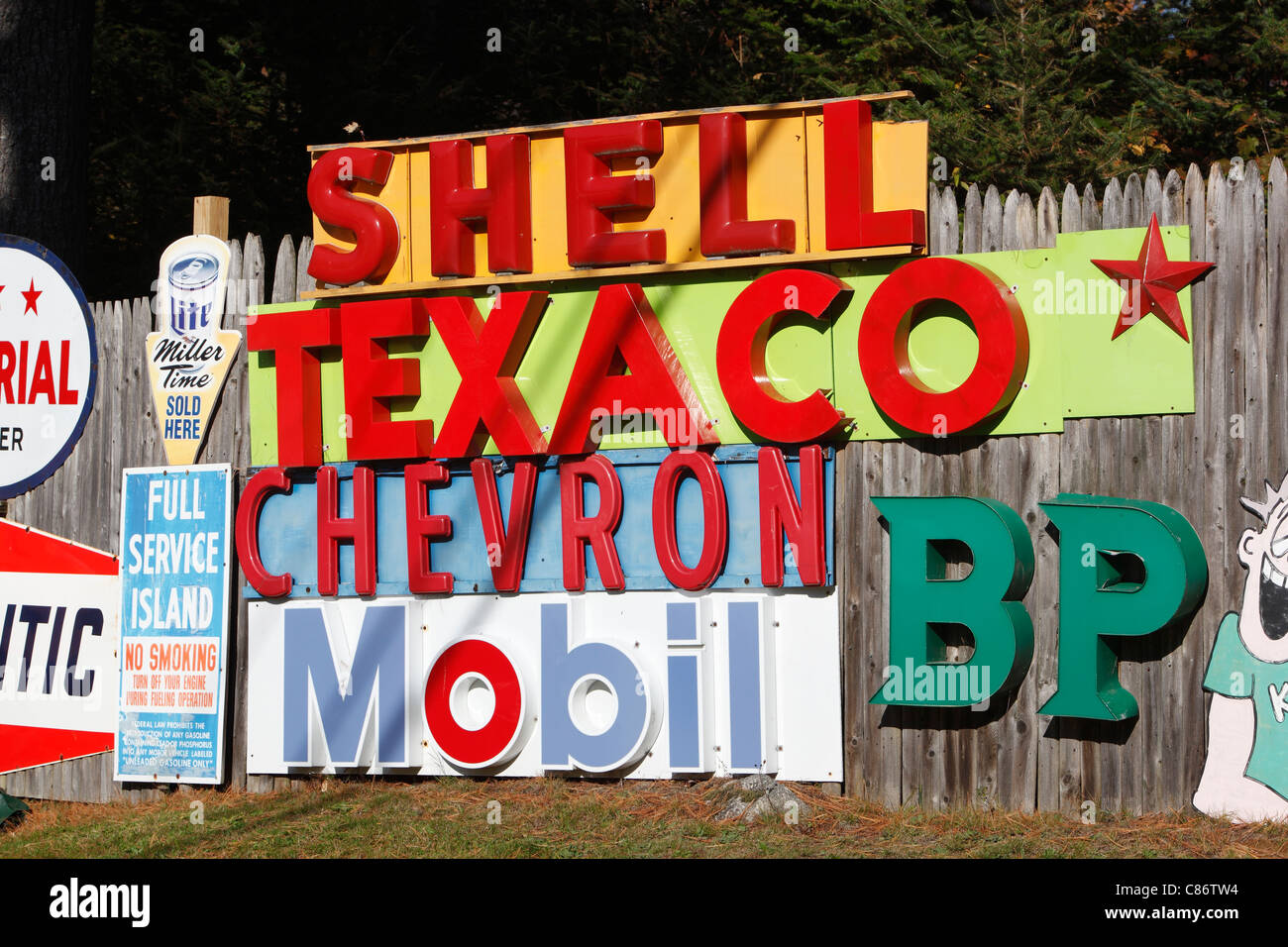 Classic oil and gas company name signs and logos on display by a collector in New Hampshire, USA Stock Photo