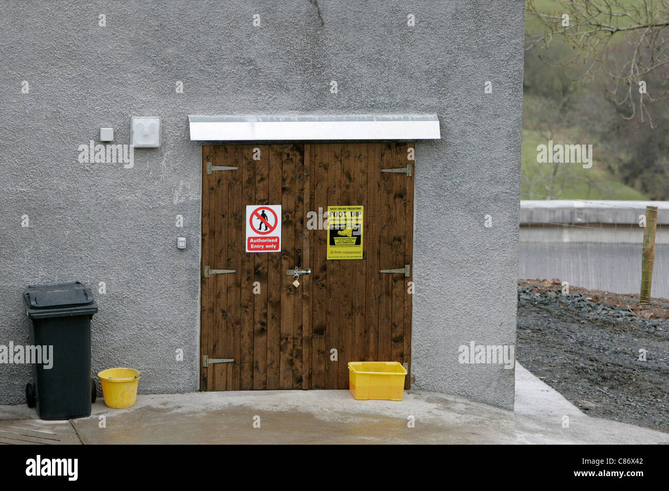 entrance to chicken turkey farm enclosure in North Antrim, Northern Ireland as fear of an outbreak of the avian bird flu H5N1 in the UK increases Stock Photo