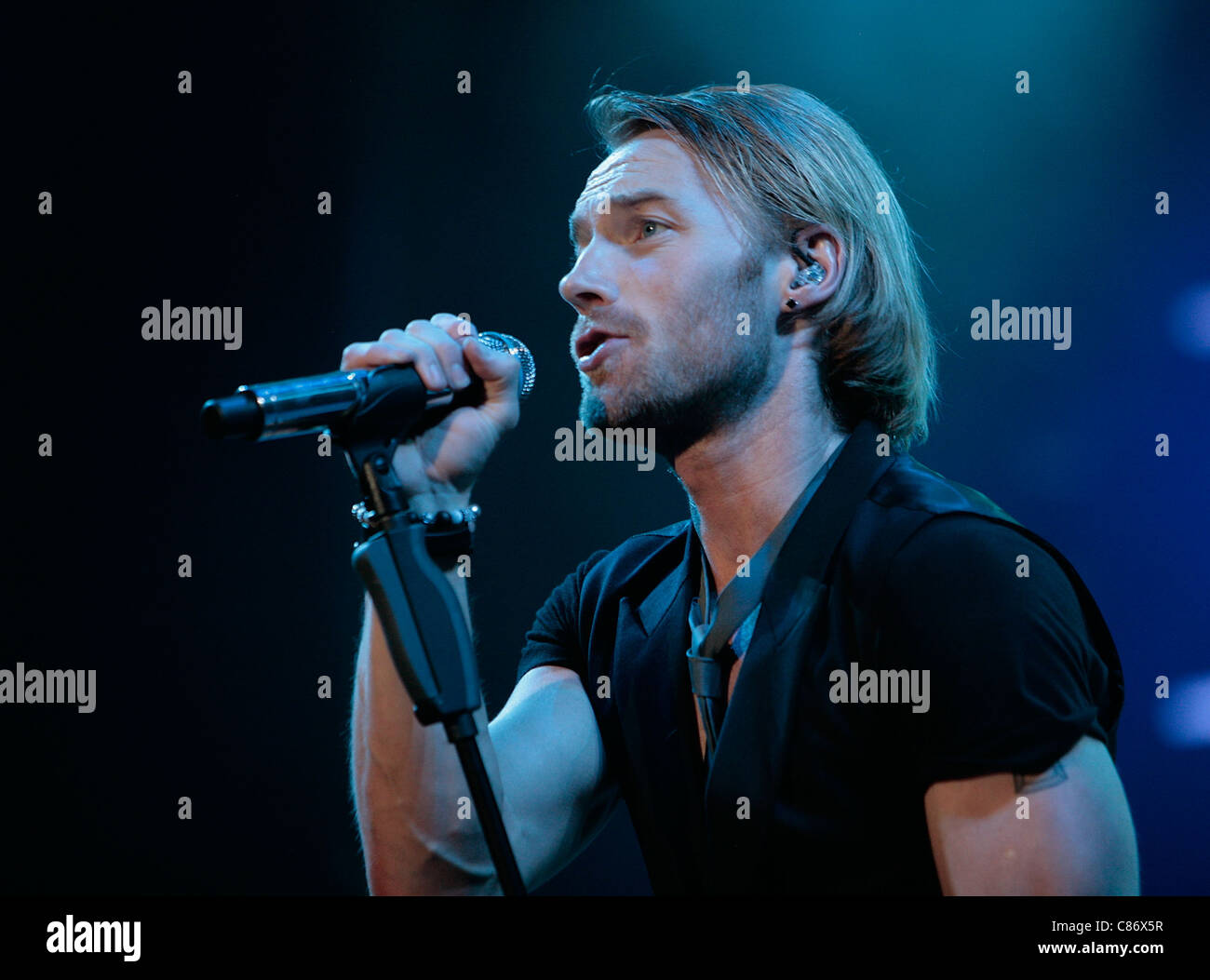 BELFAST, UNITED KINGDOM - MAY 25: Ronan Keating performs with Boyzone at the Odyssey Arena, Belfast Stock Photo