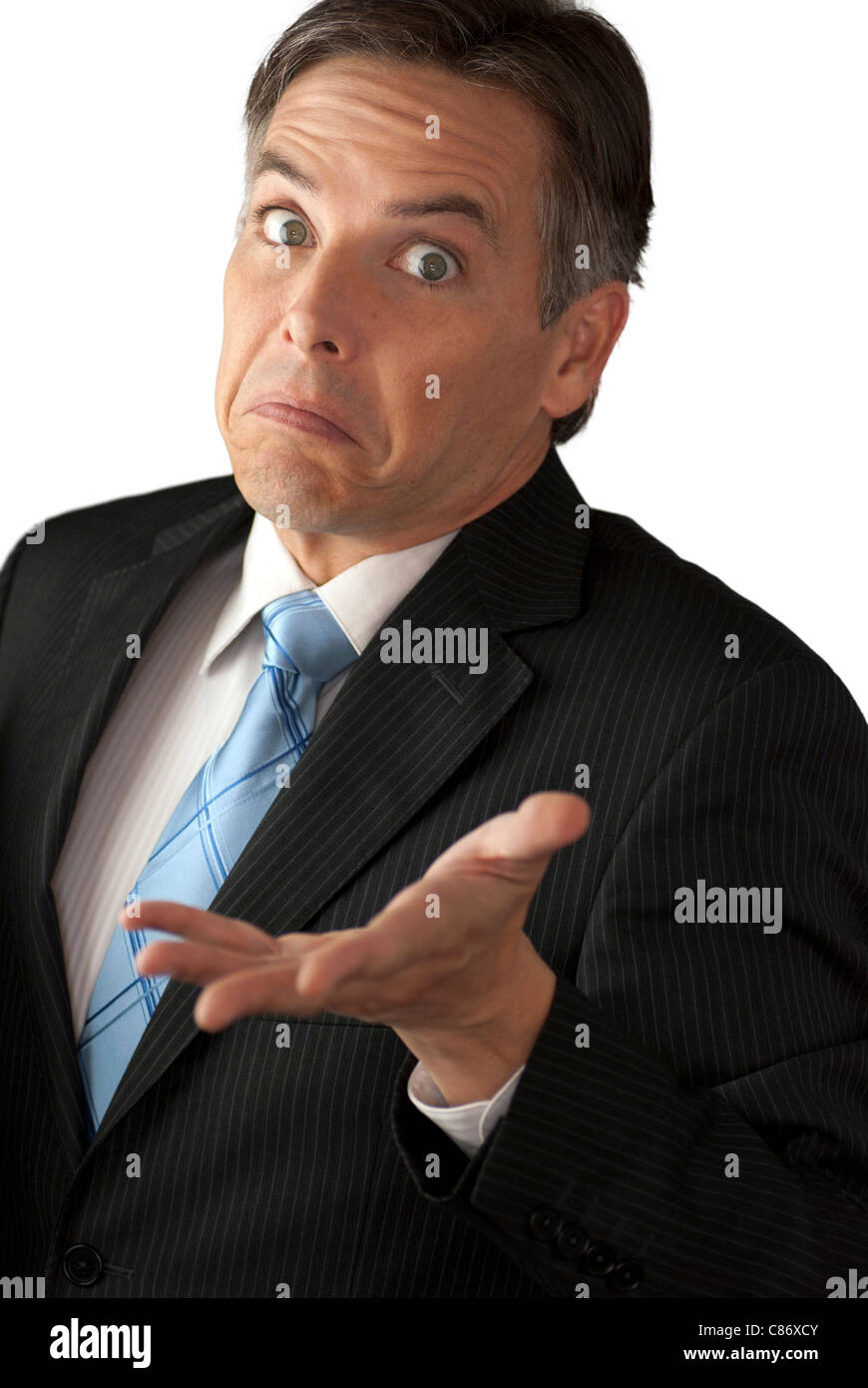 A close-up shot of a businessman gesturing to camera that he has no ideas. Stock Photo