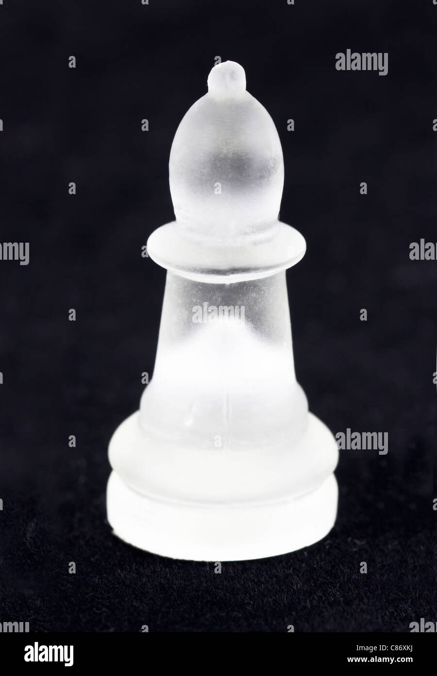 Bishop chess piece made of tinted glass Stock Photo