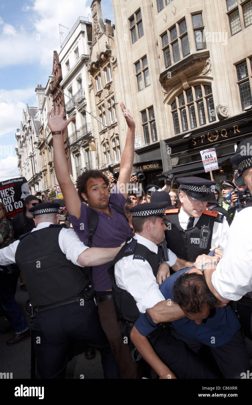 Police kettle a small group, some masked, on Whitehall after a peaceful