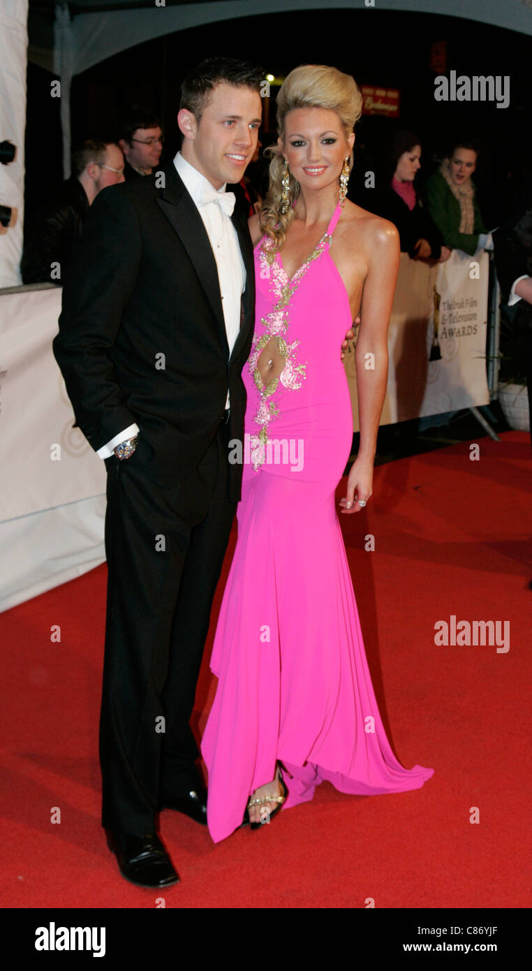 former miss ireland Rosanna Davison and guest on the red carpet at the Irish Film and Television Awards 2007 DUBLIN, IRELAND - FEBRUARY 9 Stock Photo
