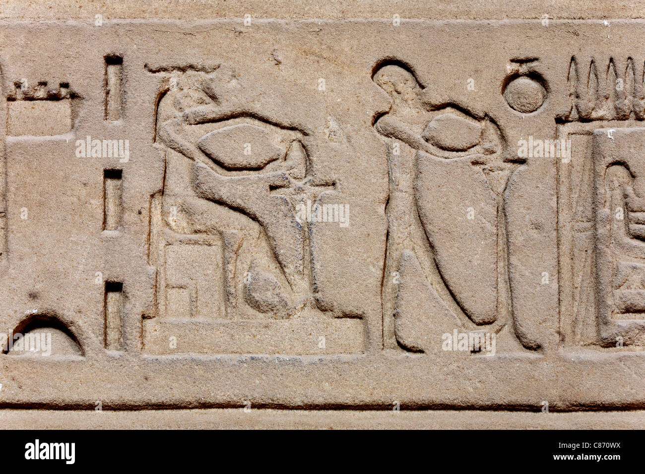 Relief of Khnum at potters wheel within the Hypostyle Hall at the Ptolemaic Roman Temple Of Khnum at Esna, Egypt Stock Photo
