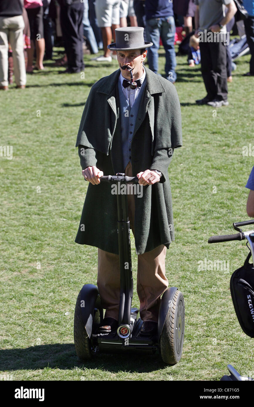 Man in period costume riding a Segway transporter at the re-enactment of  the first rugby game played in New Zealand in 1870 Stock Photo - Alamy