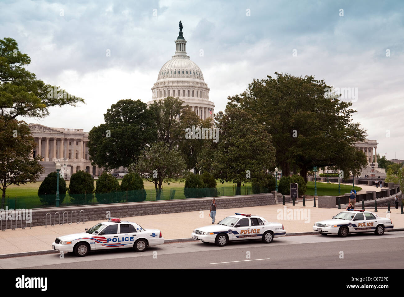 Three police cars outside the Capitol building, Washington DC USA Stock Photo