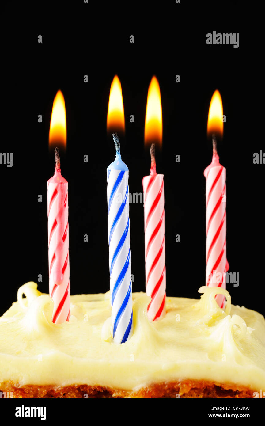 Birthday candles on black background Stock Photo Alamy