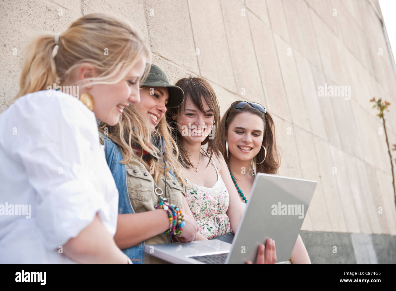Young Women Using Laptop Computer Stock Photo - Alamy