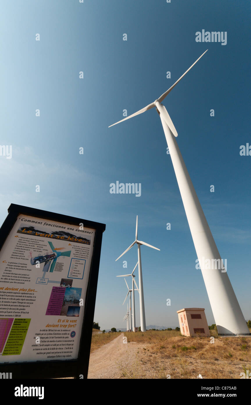An interpretative sign and wind turbines at the Rivesaltes Windfarm in the south of France. Stock Photo