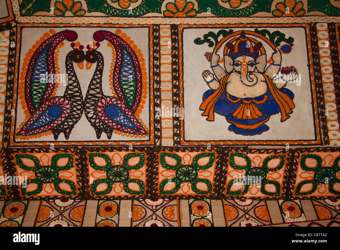 Intricate jute lace murals at 'Kobiraj Bagan Durga Puja pandal' in