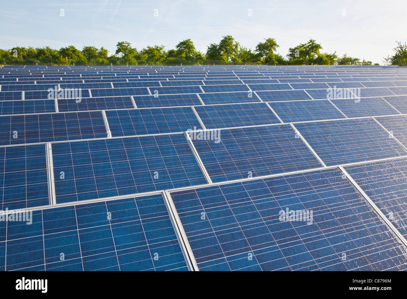 Germany, Baden-Wurttemberg, Winnenden, View of large number of solar panels at solar power plant field Stock Photo