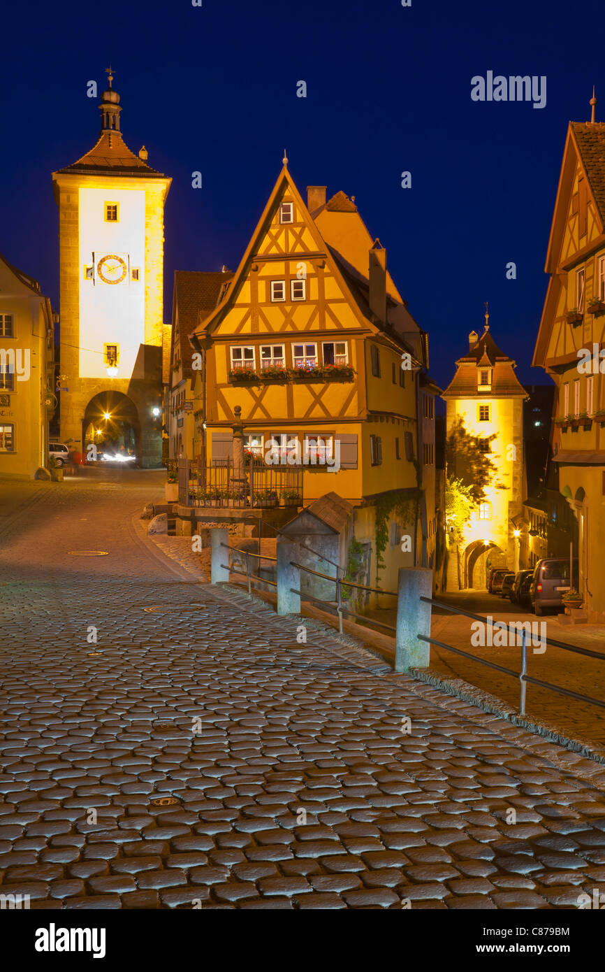 Germany Ploenlein frame houses and Siebersturm tower with cobblestone street in foreground Stock Photo