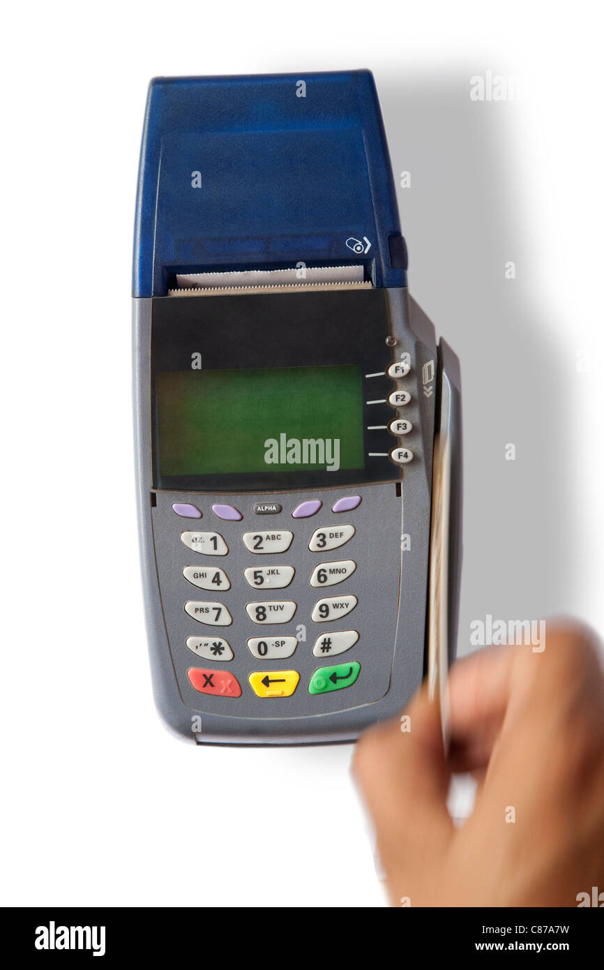 Hand swiping credit card Stock Photo