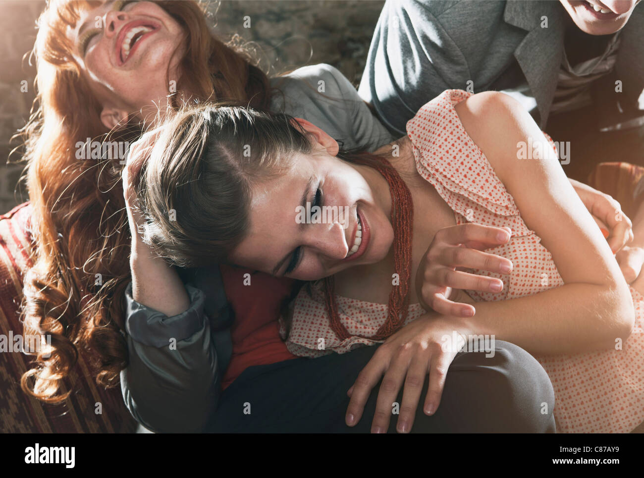 Germany, Berlin, Close up of friends having fun at party, smiling Stock Photo