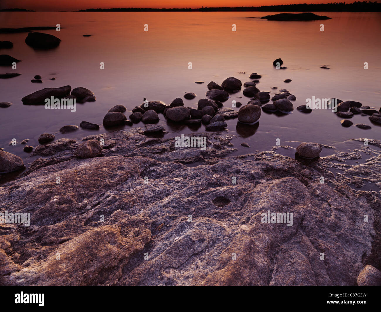 Beautiful twilight scenery of rocks on a shore of Georgian Bay, Muskoka, Ontario, Canada Stock Photo