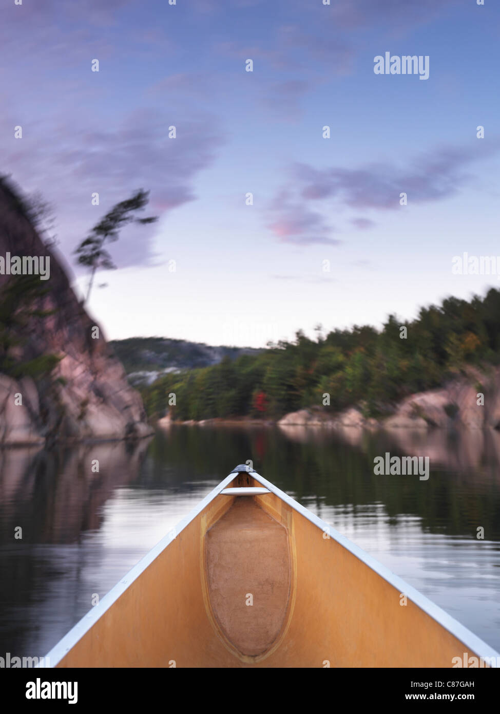 Canoeing on lake George in fall. Killarney Provincial Park, Ontario, Canada. Stock Photo