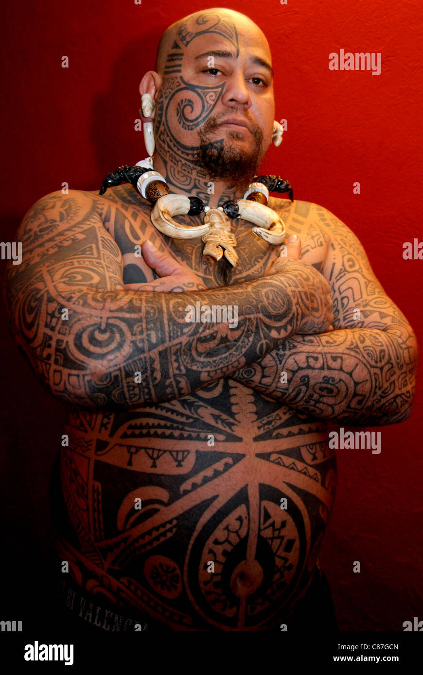A Maori tattoo artist at the Tattoo Convention, Dresden, Germany Stock Photo