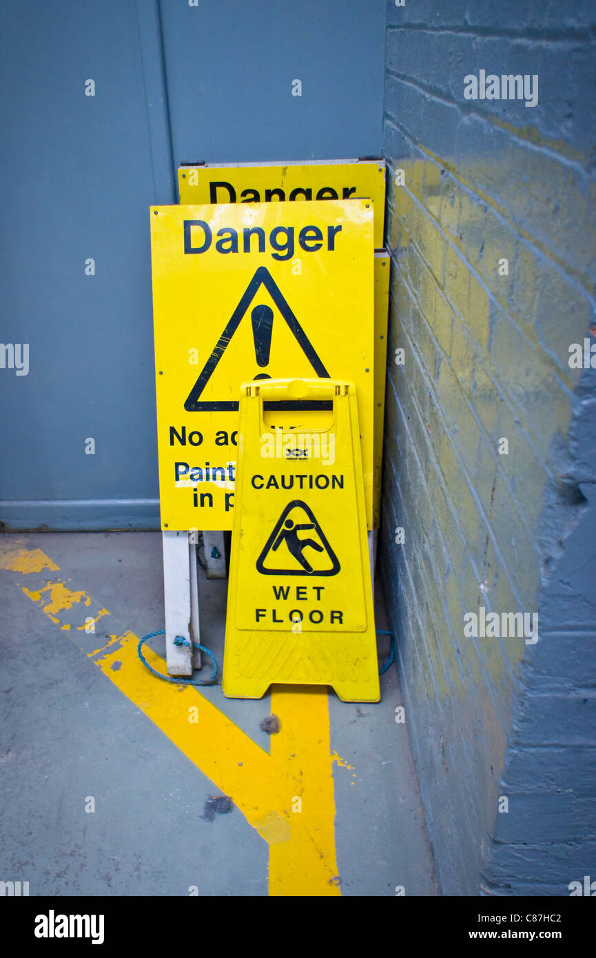 Portable safety warning signs for public places Stock Photo
