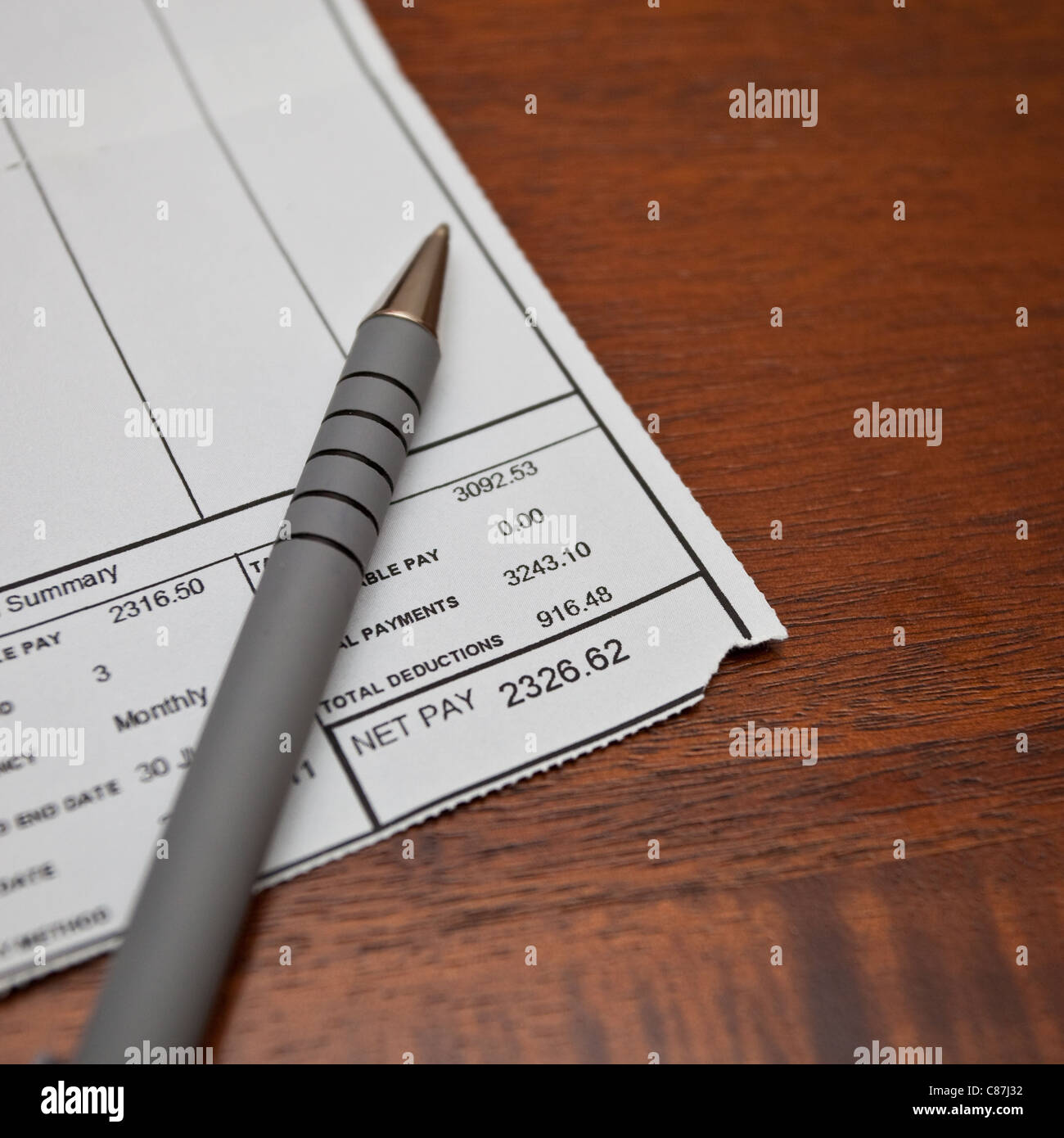 A typical payslip/pay check showing deductions due to tax and national insurance, UK, 2011 Stock Photo