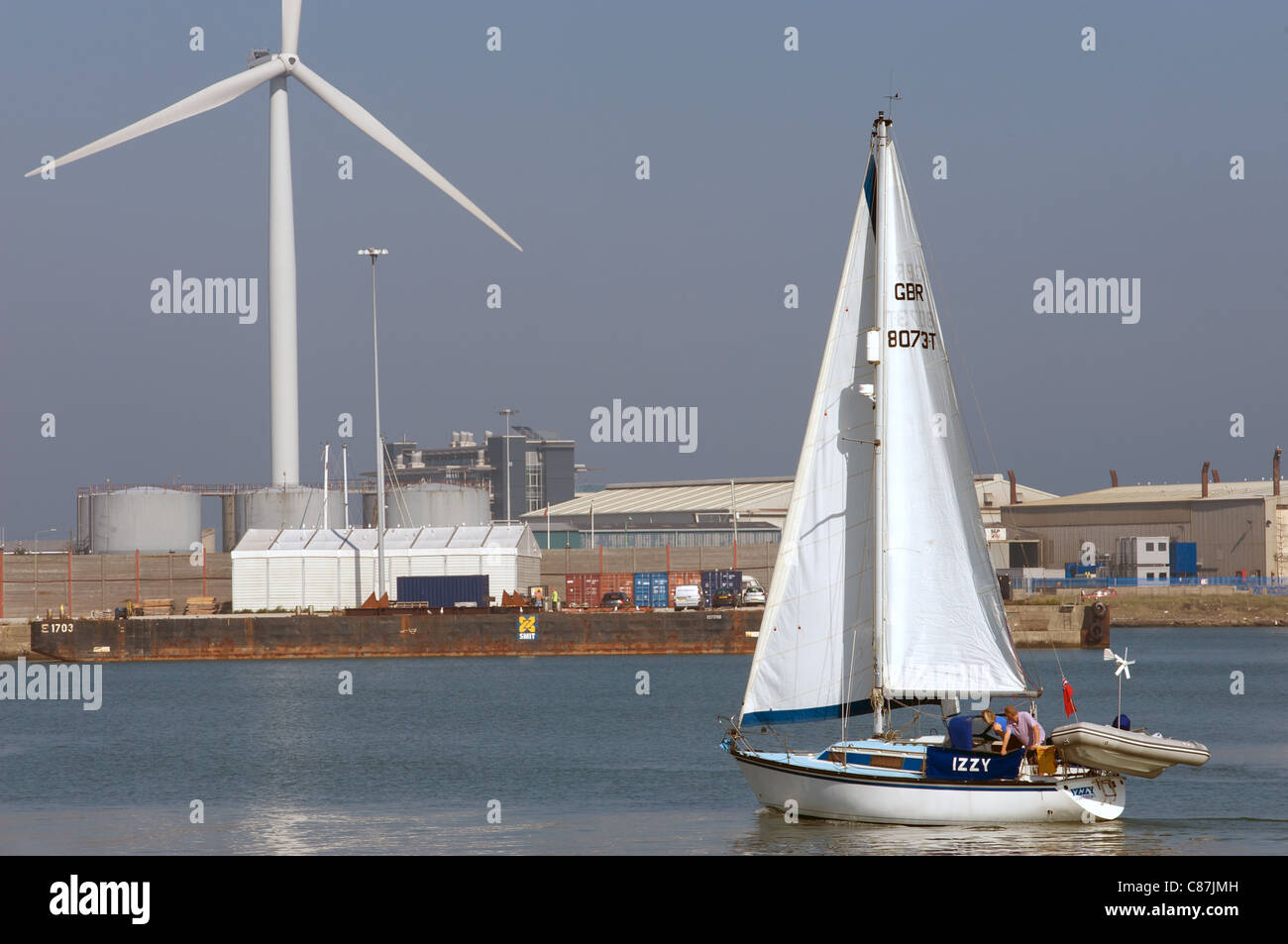 Wind turbine and yacht, Lowestoft, Suffolk, UK. Stock Photo