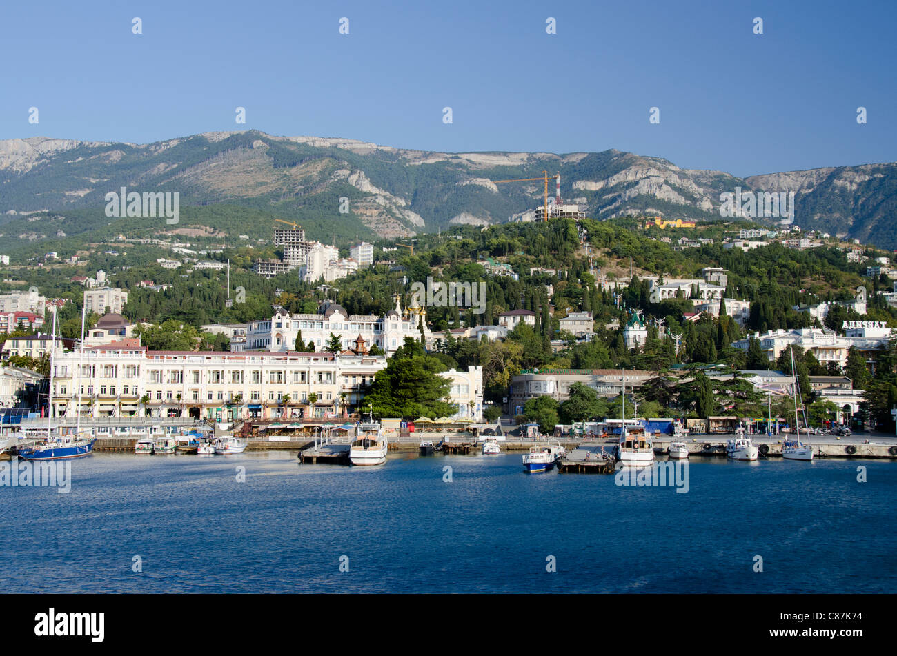 Ukraine, Yalta. Black Sea view of the port of Yalta with the Crimean